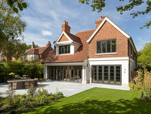 a modern house with a well-maintained garden featuring a patio and outdoor seating in a suburban setting showcasing design elements inspired by nature and harmony in seven ways