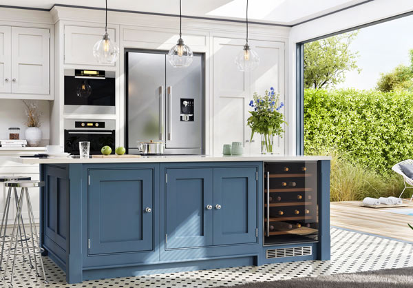 A kitchen with blue cabinets