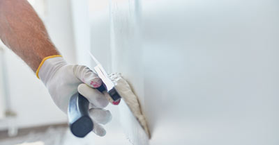 A man plastering a wall